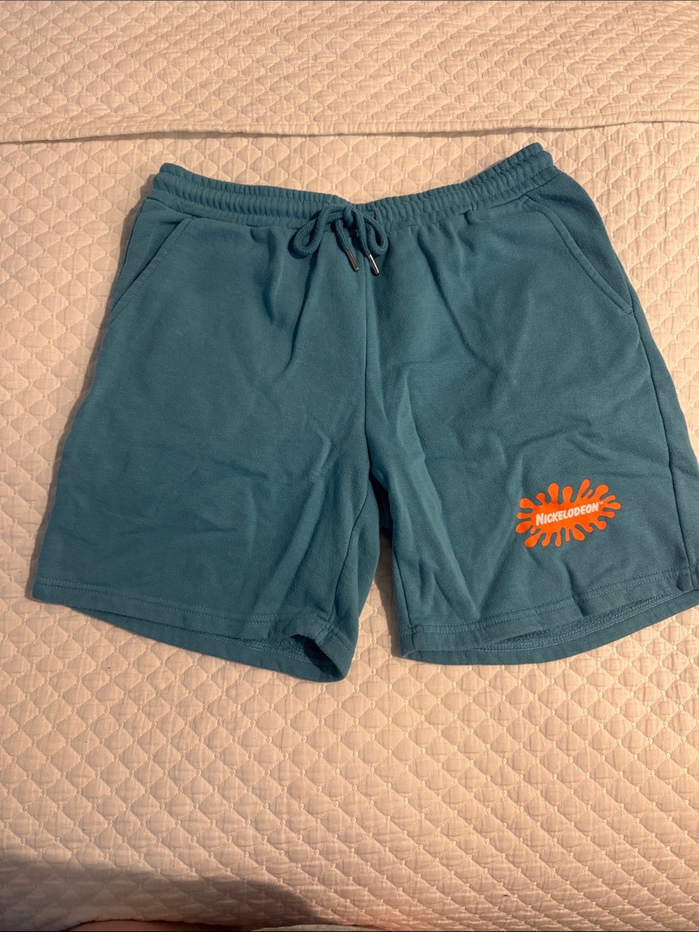 Nickelodeon Teal Men's Athletic Shorts with Orange Splash Logo